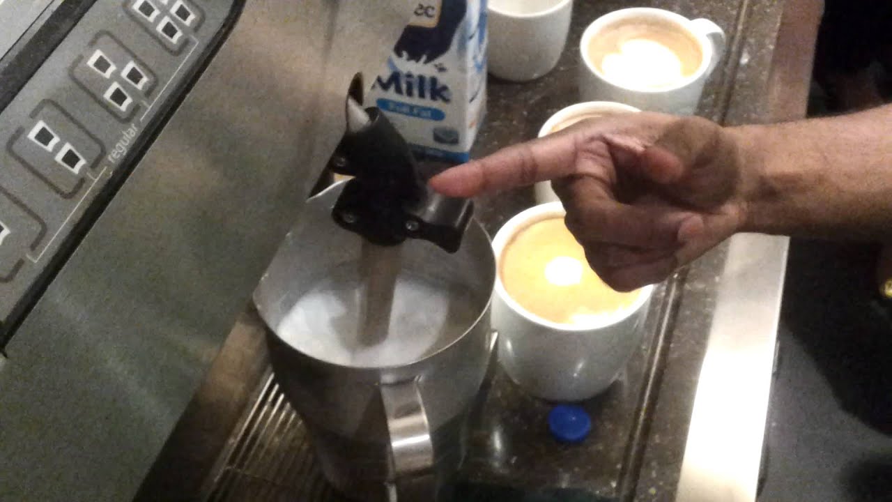 Preparing cappuccino at Starbucks training center in Starbucks Kuwait