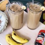 Banana coffee smoothie recipe. Energy booster. Tasty coffee with banana for brea…